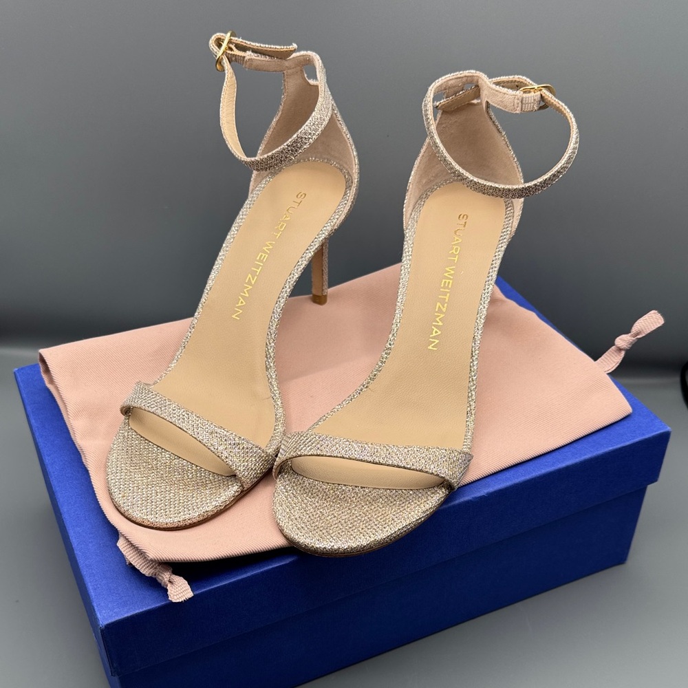 Stuart Weitzman Gold Strappy Heels
New never worn
Size 7